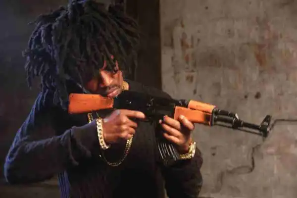 SARS Officials Held Singer Jhybo For Carrying A Rifle In A Photo